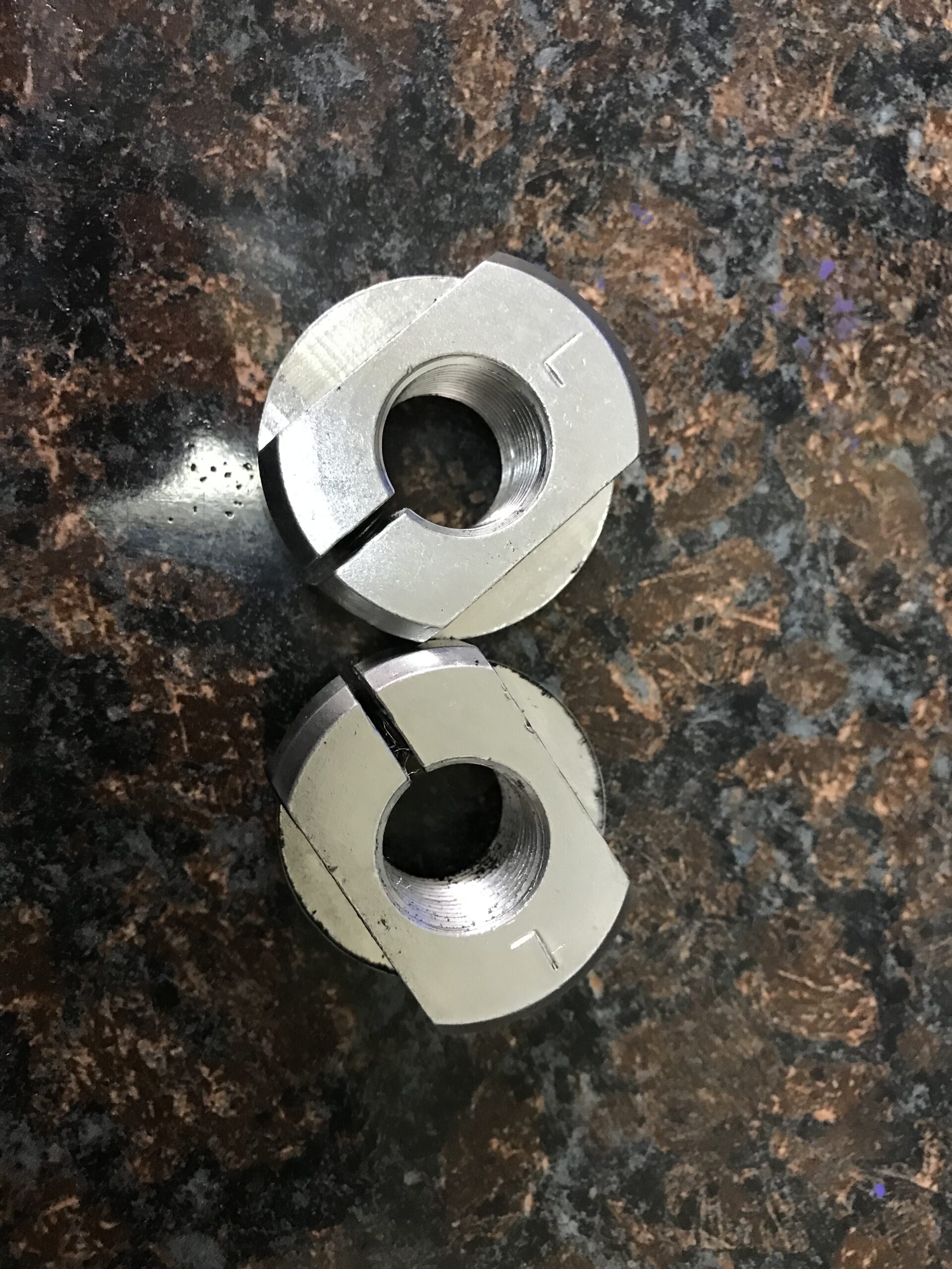 Top View of Stock vs Custom Link Pin Clamp Nuts.